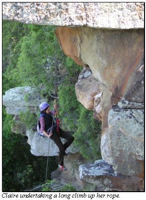 Claire undertaking a long climb up her rope